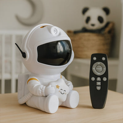 Lampe veilleuse enfant en forme de cosmonaute, projection étoiles